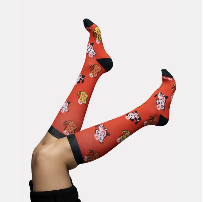 For professionals with a playful side, the Cats & Dogs Compression Socks are a crowd-pleaser. They’re a perfect gift for hospitality workers or first responders who love animals and need reliable leg support.