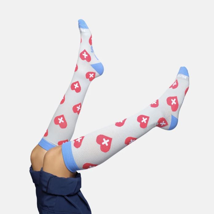 Healthcare pros, show your heart with the Hearts Compression Socks! Featuring a charming heart pattern, these socks celebrate your dedication while providing leg pain relief.