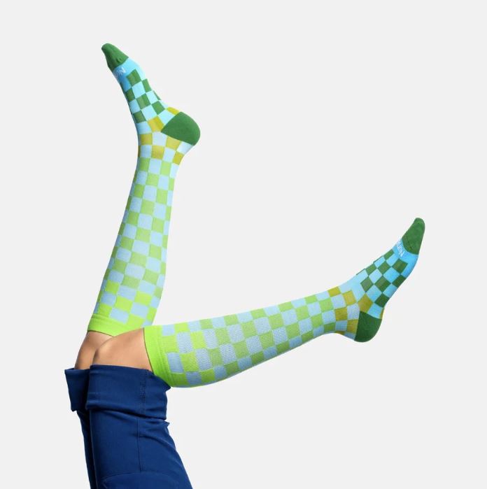Athletes and fitness enthusiasts rave about the Checkered Compression Socks for their retro style and recovery benefits.