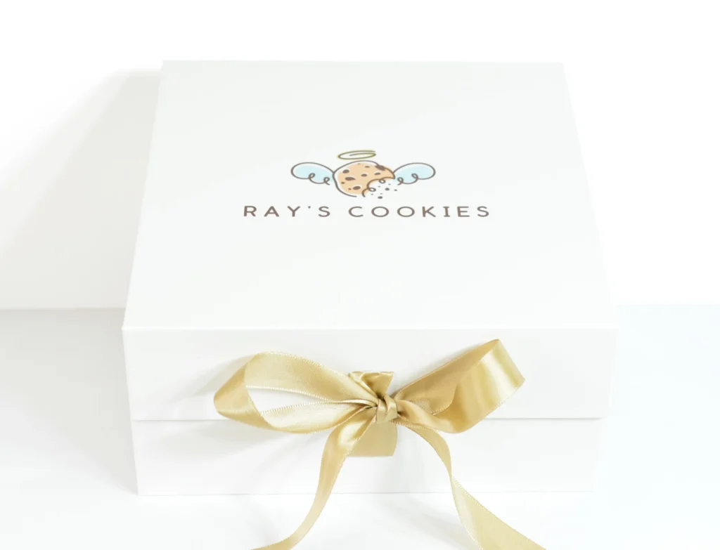 Elegant Ray's Cookies gift box with gold ribbon, ideal for corporate gifting, holidays, or premium cookie delivery.